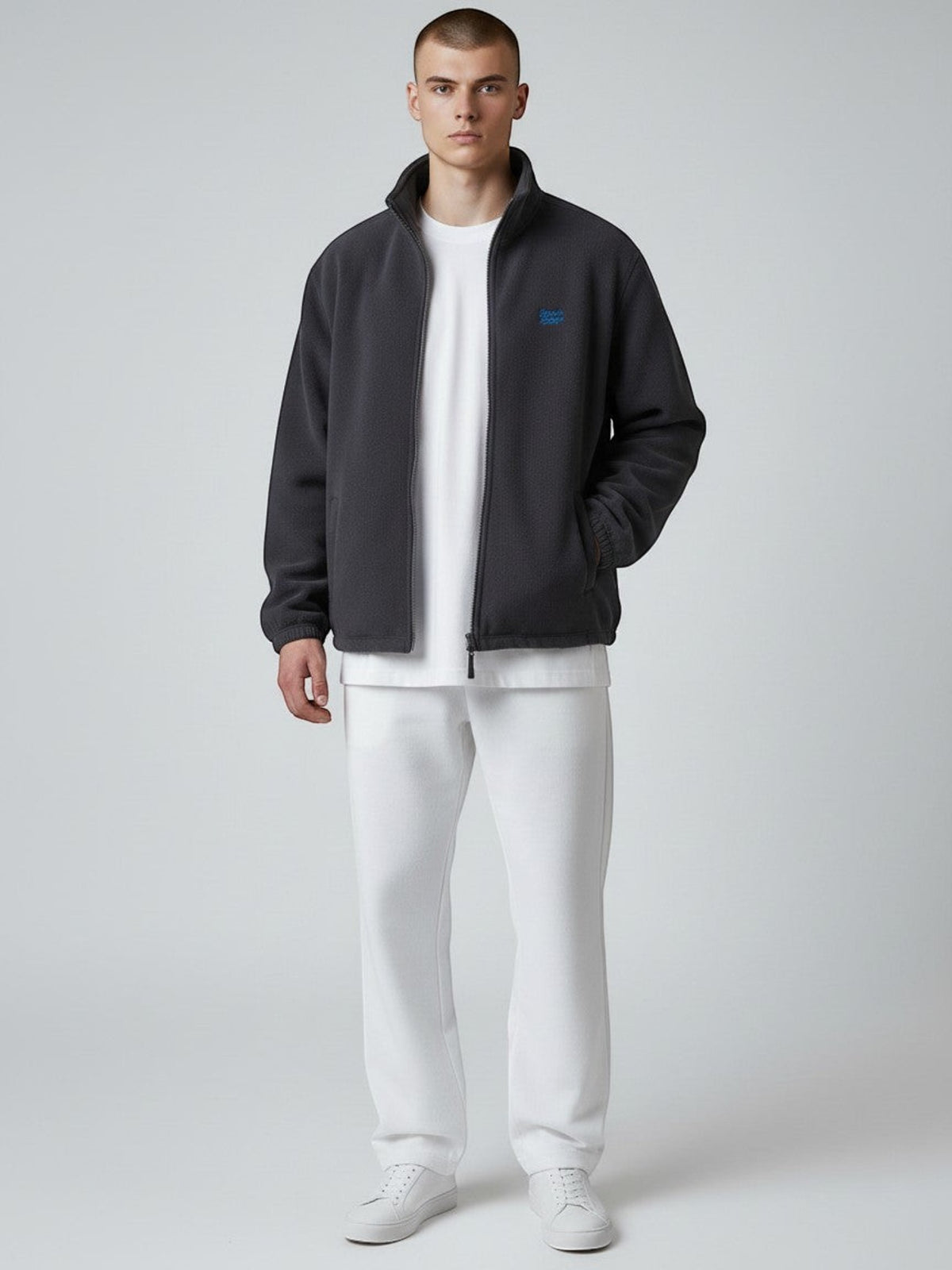 BeachBodyz® dark grey fleece jacket with blue embroidered logo, full zip and side pockets. Streetwear style.