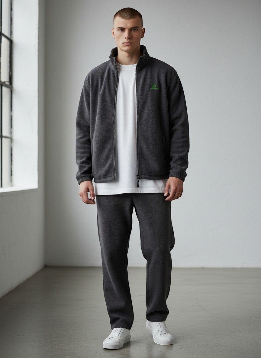 BeachBodyz® dark grey fleece jacket with zip and green logo. Unisex streetwear style.