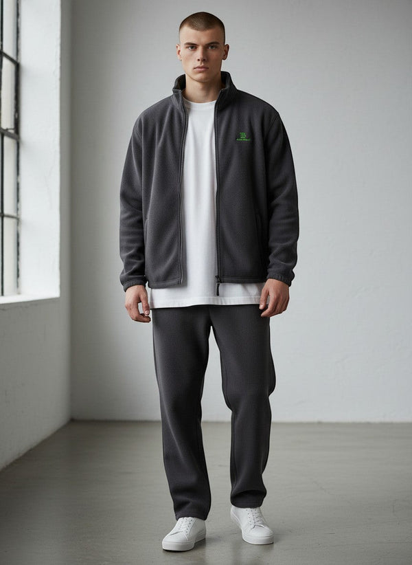 BeachBodyz® dark grey fleece jacket with zip and green logo. Unisex streetwear style.