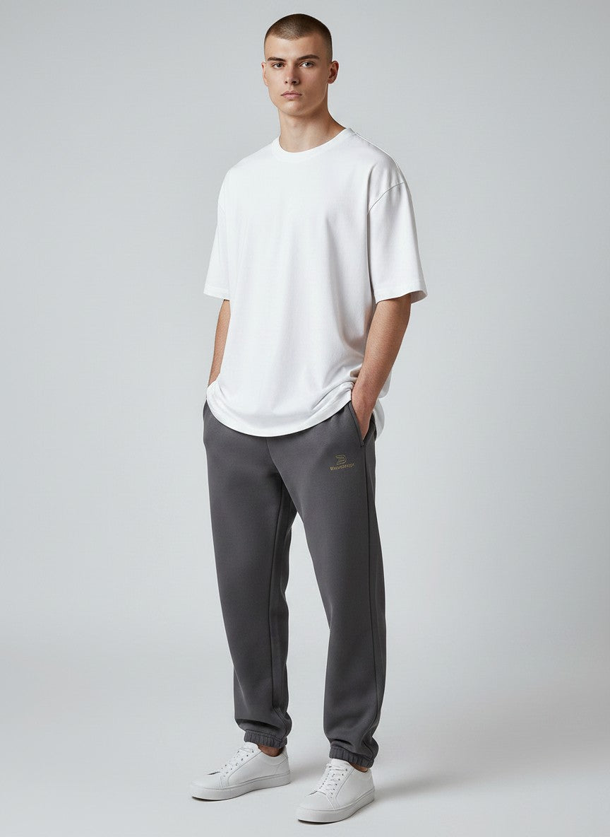 BeachBodyz® dark grey fluffy oversized jogging pants with elastic waistband and cuffs, featuring a subtle embroidered logo.