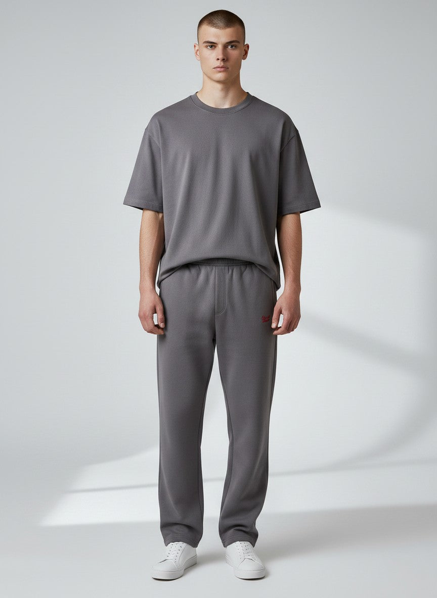 BeachBodyz® dark grey cotton-blend jogging pants with red logo embroidery and elastic waistband.