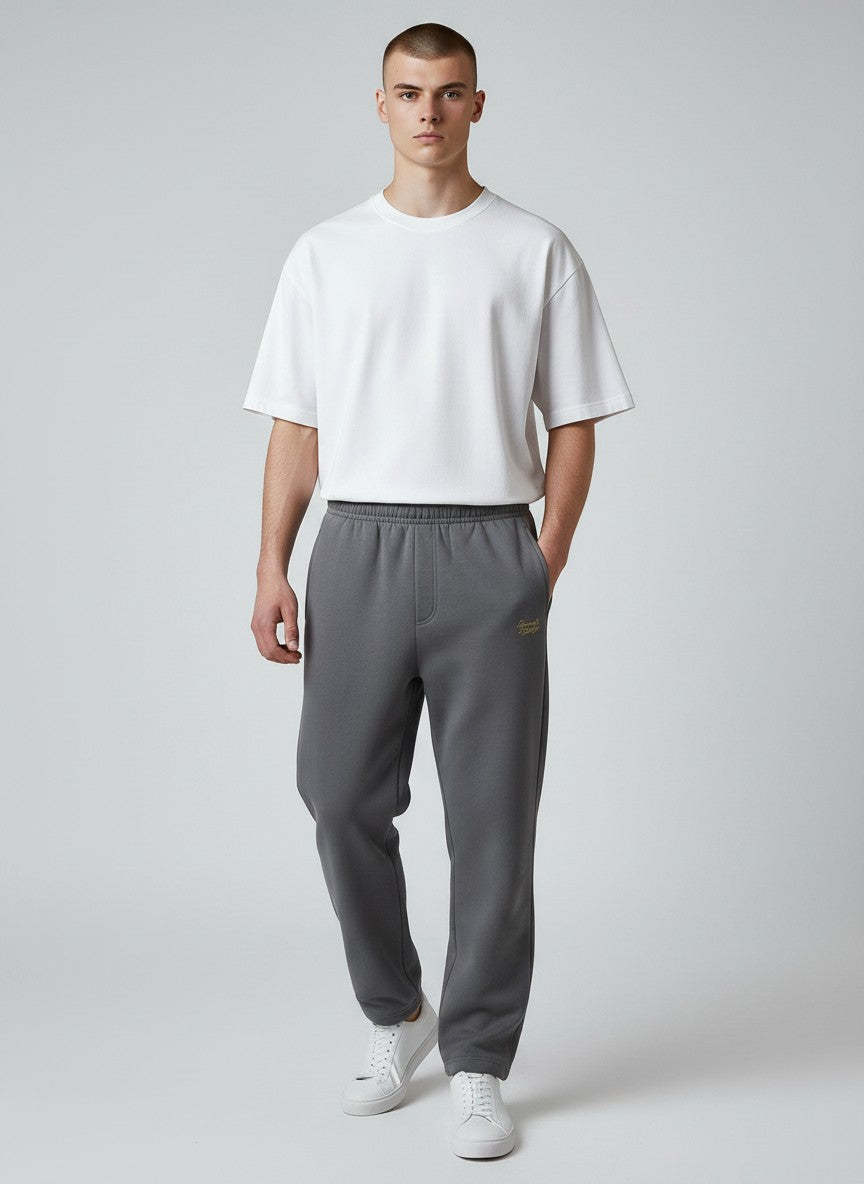 BeachBodyz® dark grey cotton-polyester blend jogginghose with elastic waistband and subtle logo embroidery.