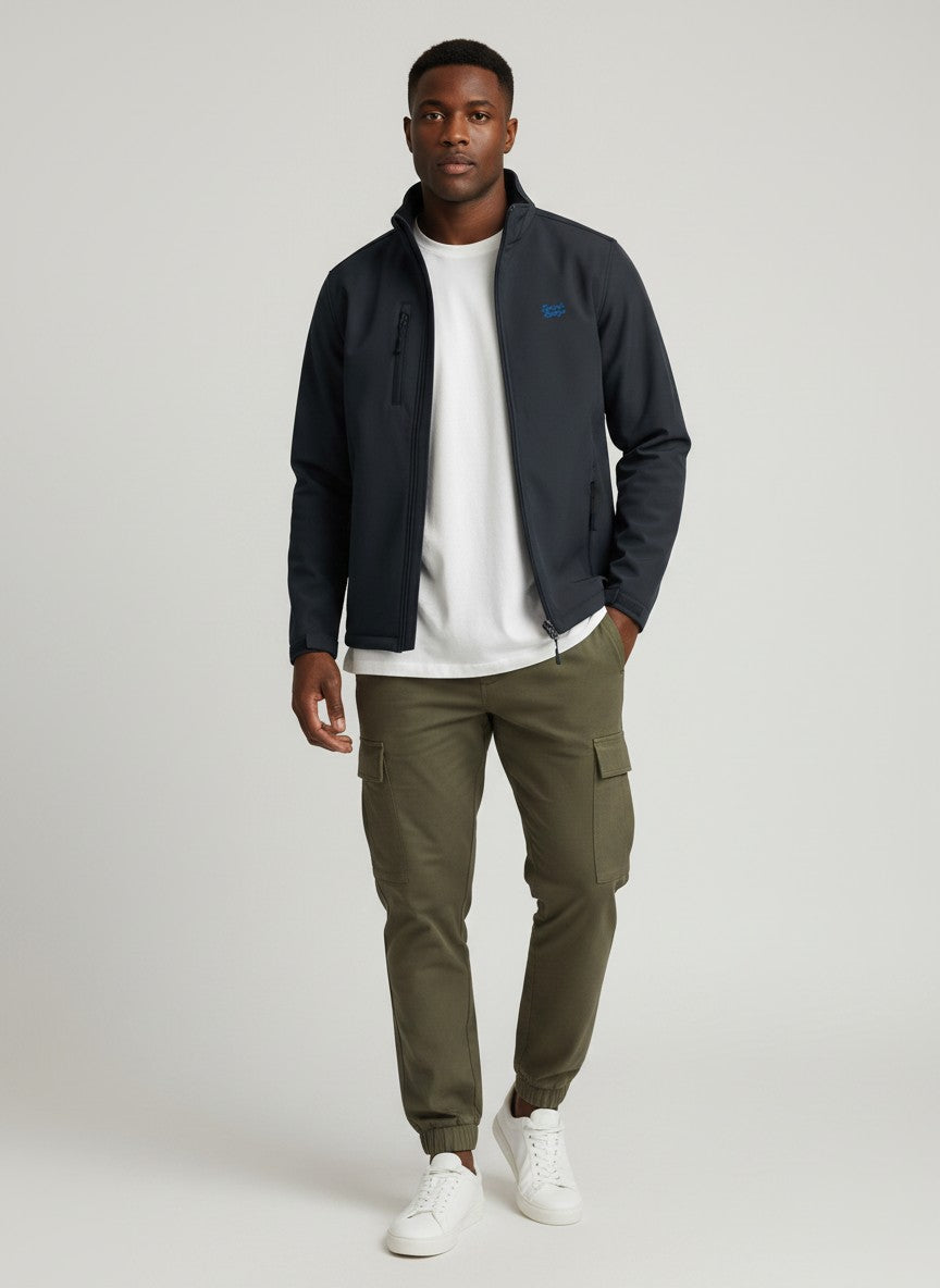 BeachBodyz® dark grey softshell jacket with blue logo, zip pockets, and stand-up collar. Water and wind-resistant.