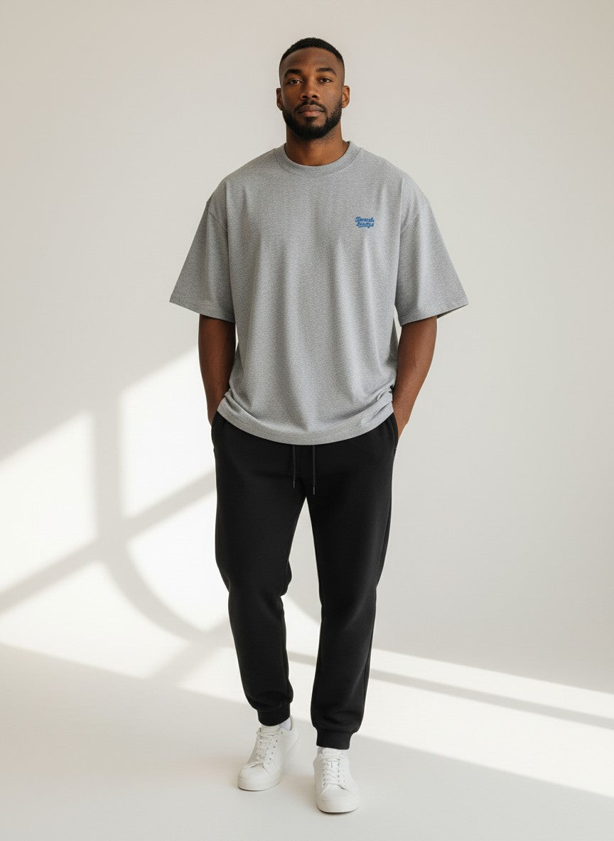 BeachBodyz® grey oversized t-shirt made from bio-cotton with a small blue embroidered logo on the chest.