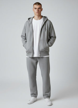 BeachBodyz® heather grey zip-up hoodie with subtle logo embroidery and front pockets. Made from a soft cotton blend.