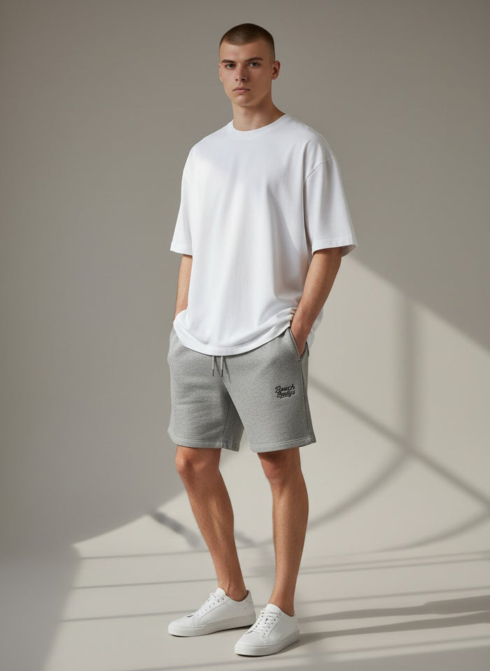BeachBodyz® heather grey cotton blend jogger shorts with embroidered logo and drawstring waist.