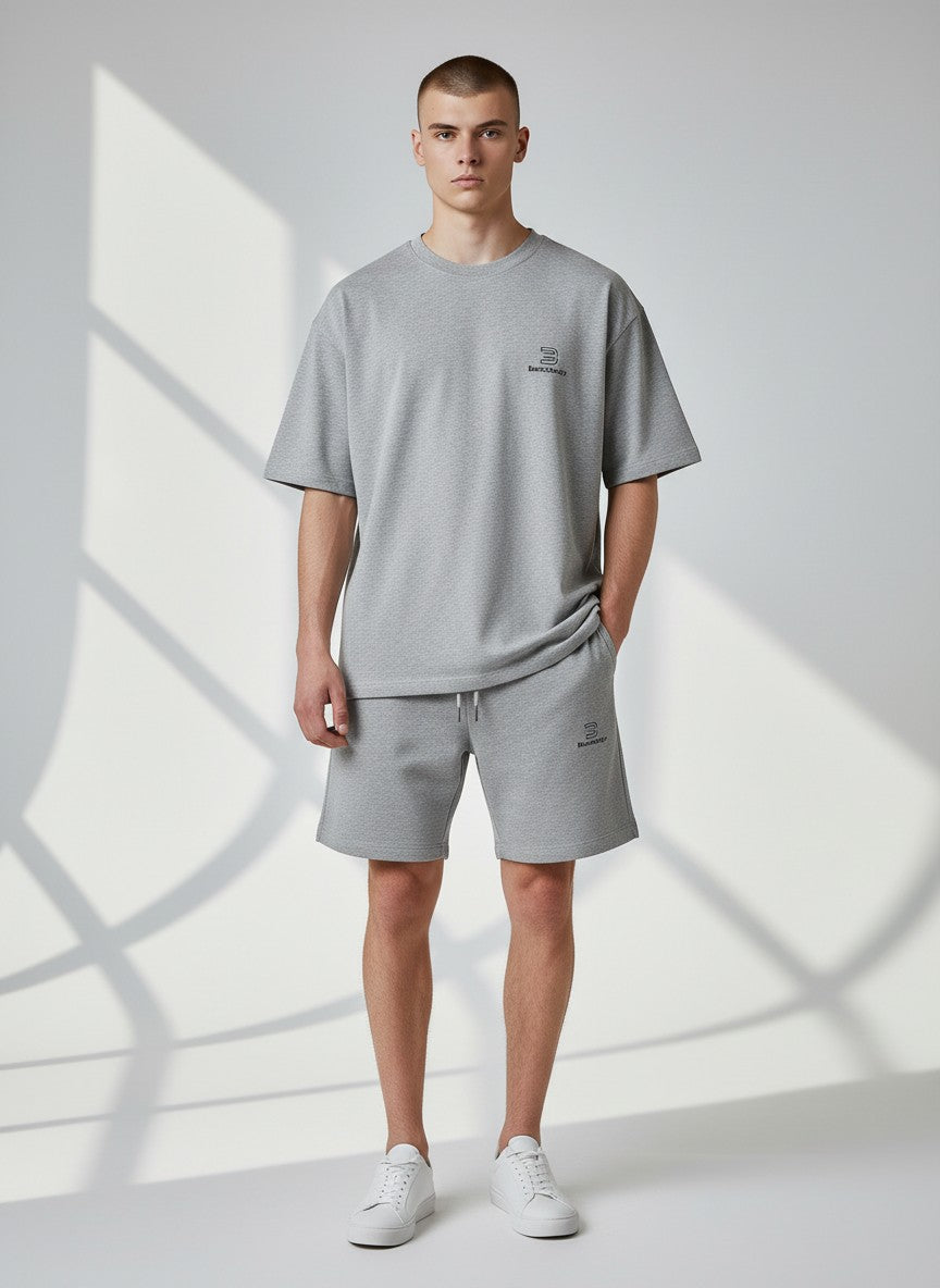 BeachBodyz® heather grey cotton blend jogger shorts with embroidered logo and drawstring waist.