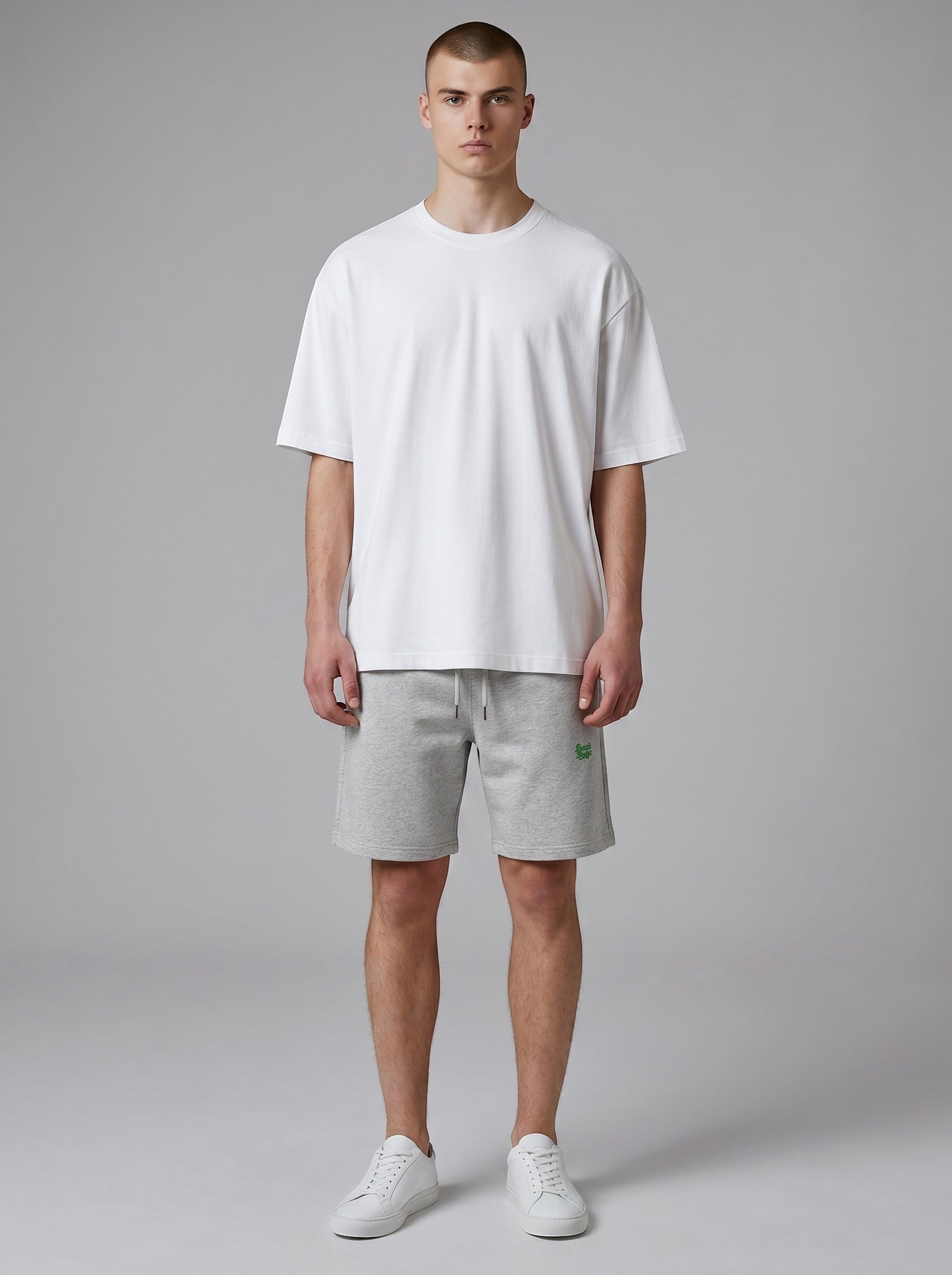 BeachBodyz® heather grey cotton blend jogger shorts with embroidered logo and drawstring waist.