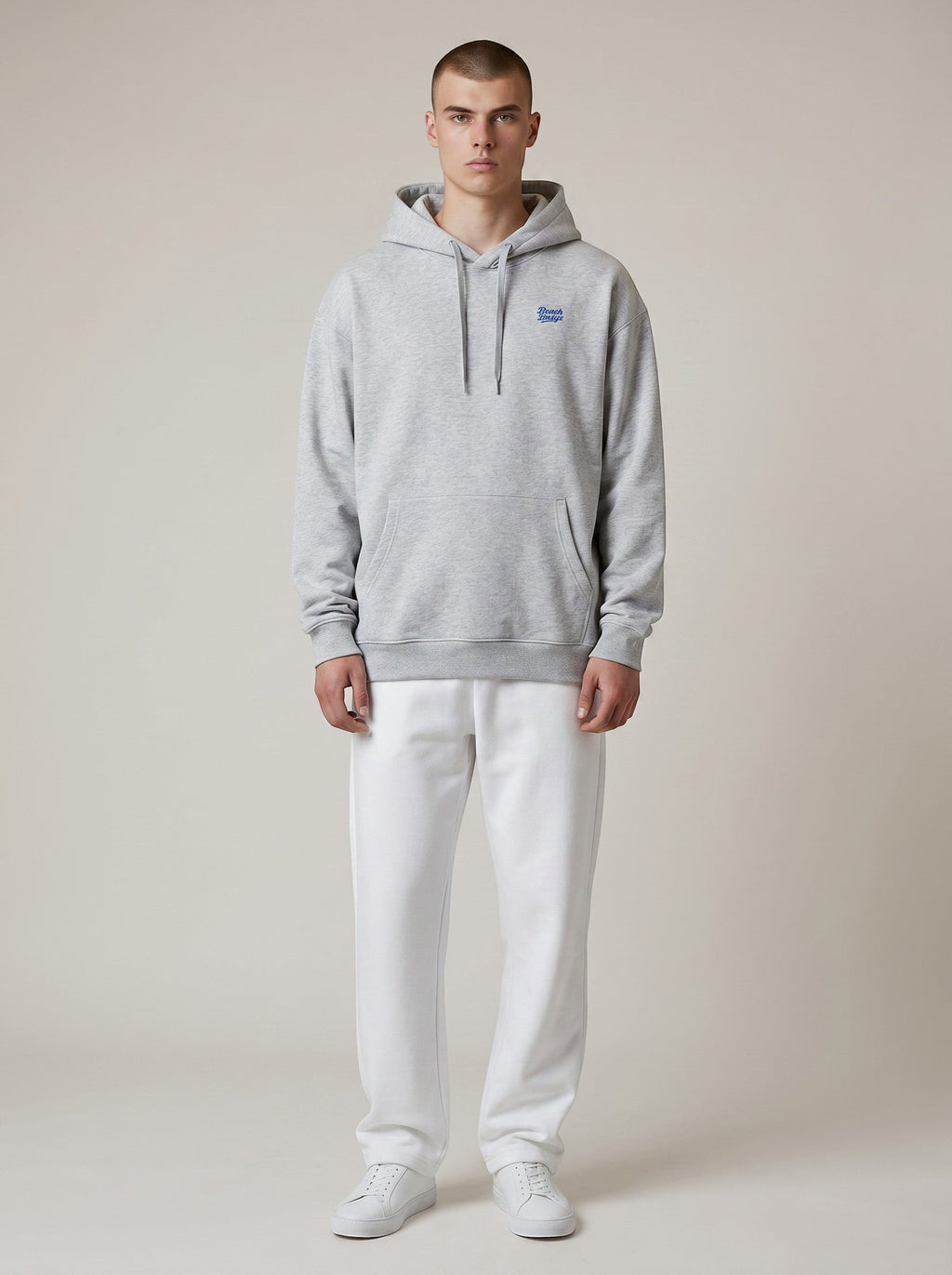BeachBodyz® heather grey oversized organic cotton hoodie with blue 'Blau Tab' embroidery and a kangaroo pocket.