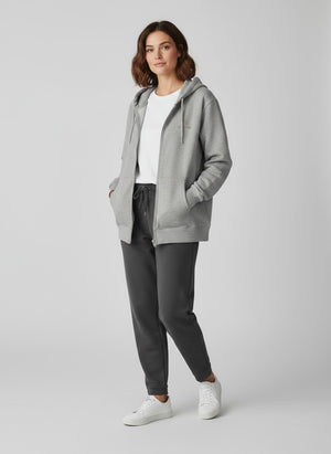 BeachBodyz® heather grey organic cotton blend zip-up hoodie with subtle "Silence" embroidery on the chest.
