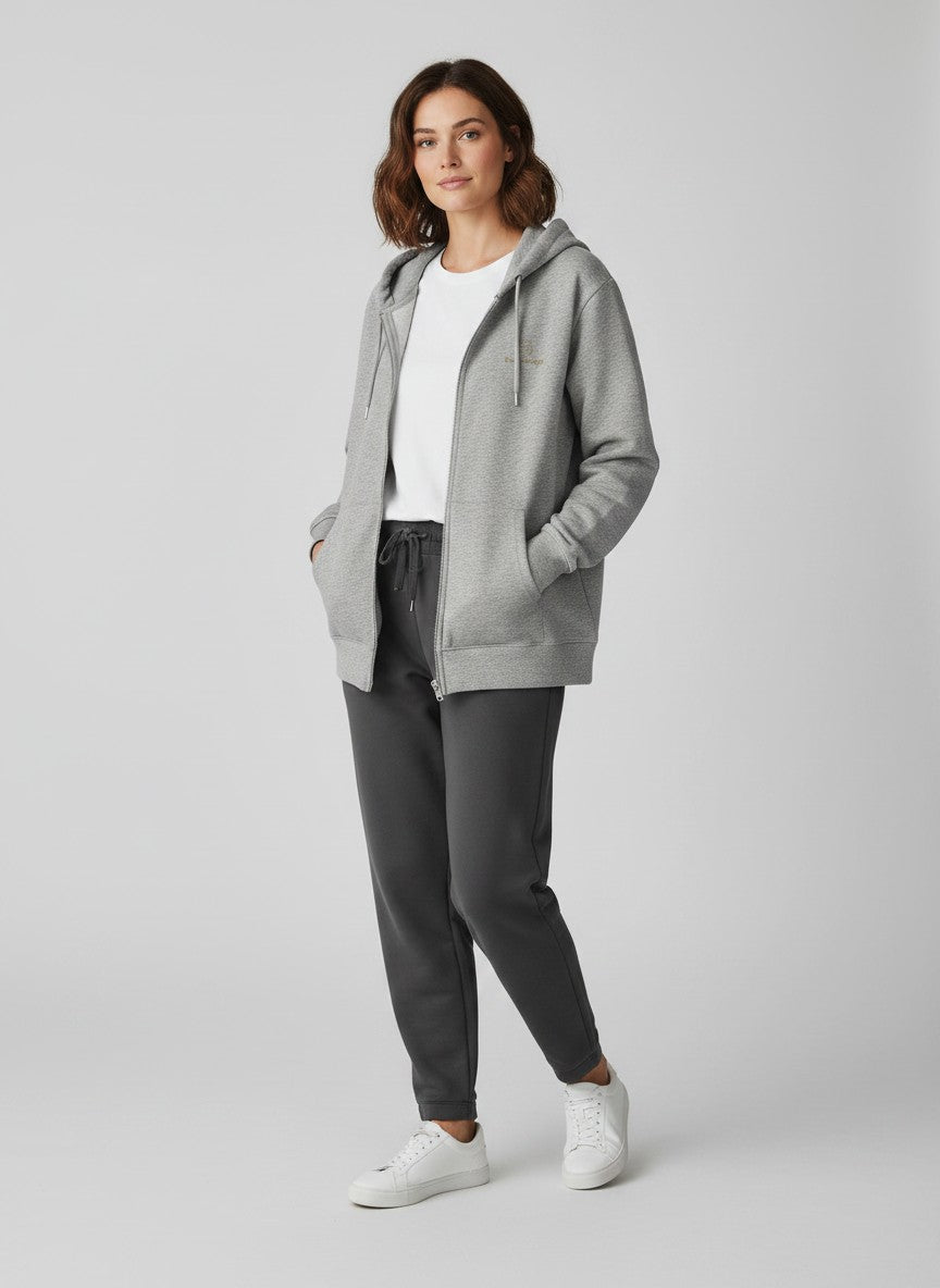 BeachBodyz® heather grey organic cotton blend zip-up hoodie with subtle "Silence" embroidery on the chest.