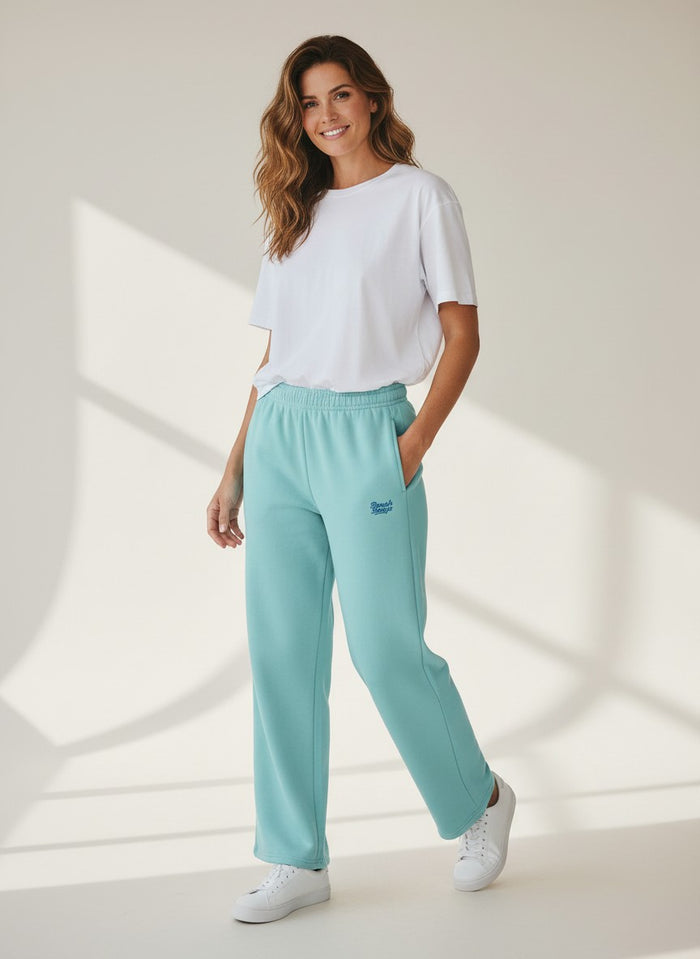 BeachBodyz® light blue cotton blend joggers with elastic waistband and subtle logo.