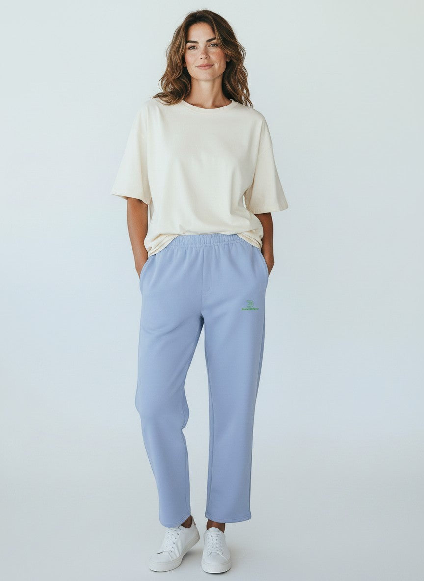 BeachBodyz® light blue cotton blend jogging pants with green logo. Comfortable streetwear for men and women.
