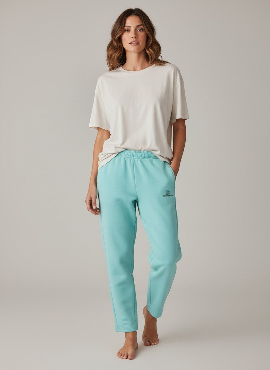 BeachBodyz® light blue cotton blend jogging pants with elastic waistband and subtle logo.