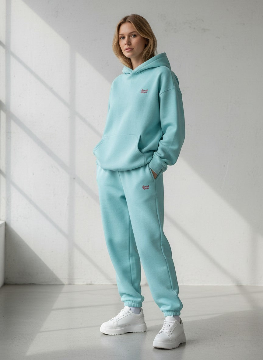 BeachBodyz® light blue fluffy cotton blend oversized jogging pants with embroidered logo and cuffed ankles.