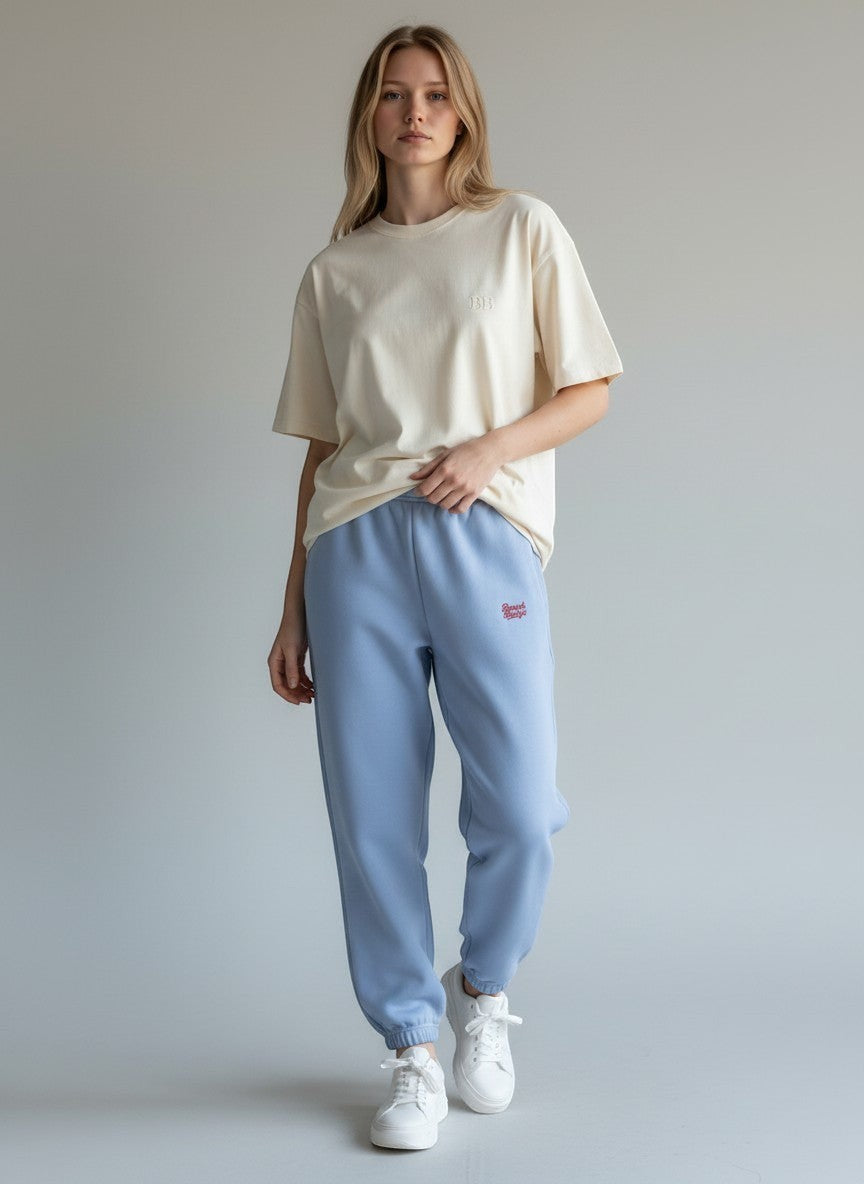 BeachBodyz® light blue fluffy cotton blend oversized jogging pants with red embroidered logo.