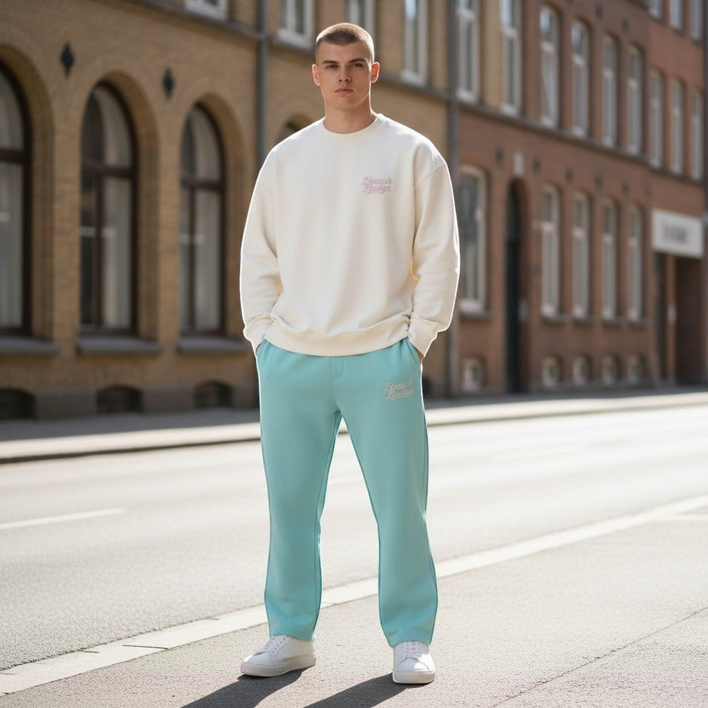 BeachBodyz® light blue cotton blend jogging pants with elastic waistband and embroidered logo.