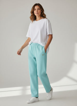 BeachBodyz® light blue cotton-polyester blend jogging pants with elastic waistband and subtle logo embroidery.