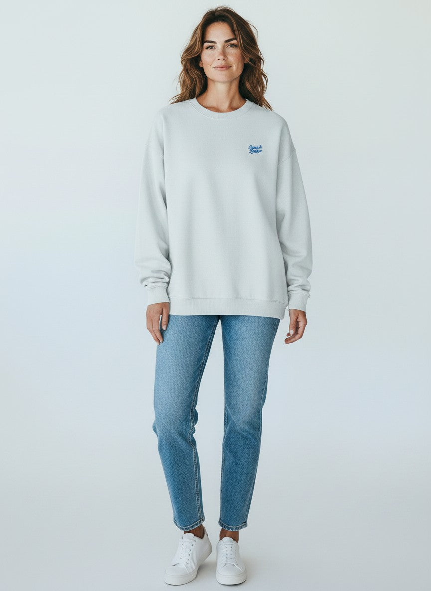 BeachBodyz® light blue oversized sweatshirt made from organic cotton with a small blue embroidered logo on the chest.