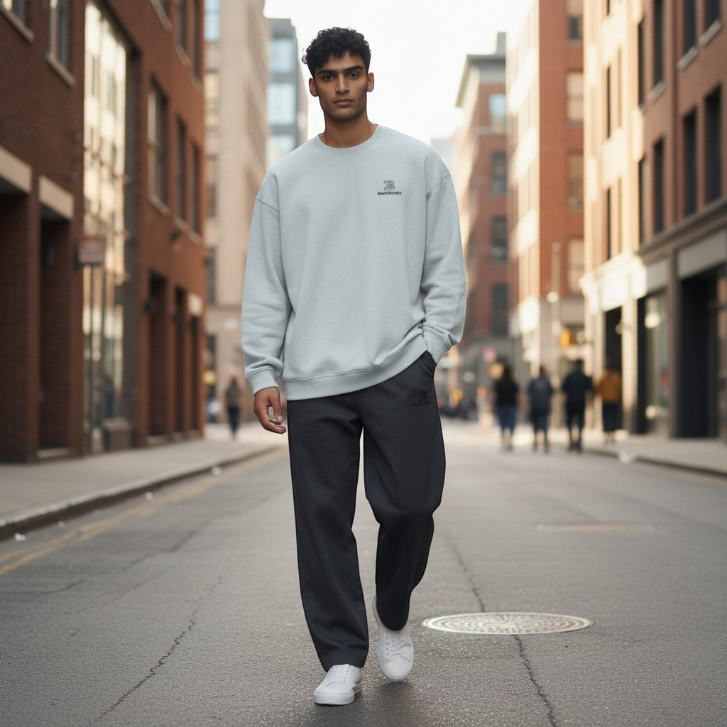 BeachBodyz® light blue oversized cotton sweatshirt with embroidered logo on chest.