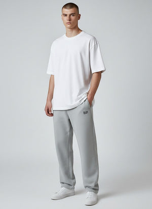 BeachBodyz® light grey oversized fluffy jogging pants with elastic waistband and subtle logo embroidery.