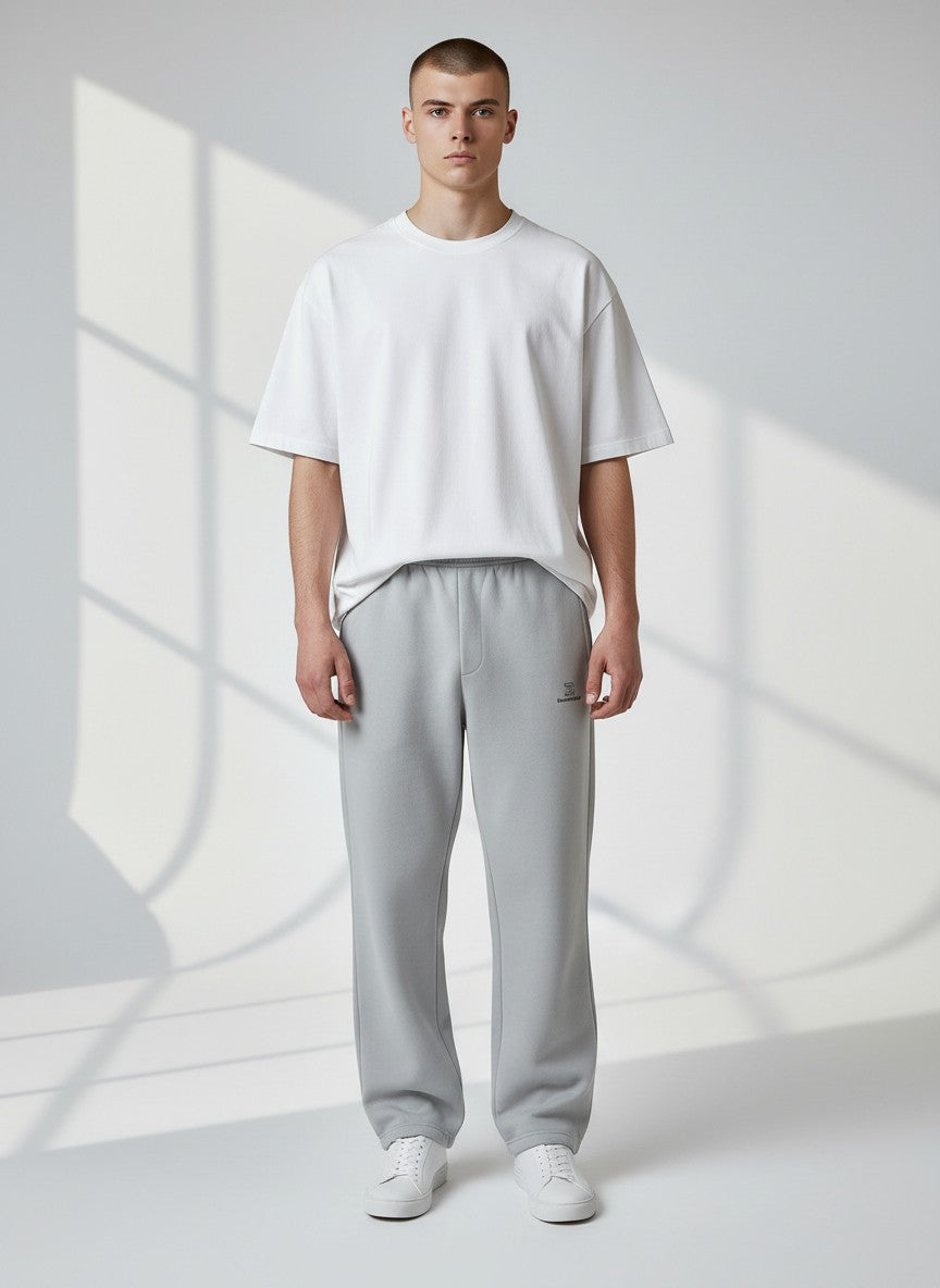 BeachBodyz® light grey fluffy oversized jogging pants with elastic waistband and cuffs, featuring a small logo on the left thigh.