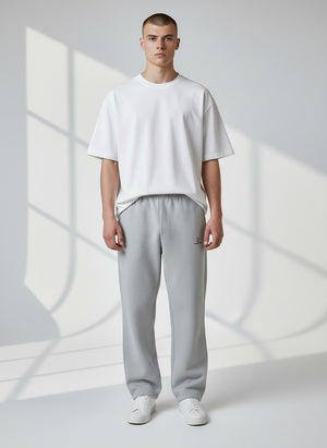BeachBodyz® light grey fluffy oversized jogging pants with elastic waistband and cuffs, featuring a small logo on the left thigh.