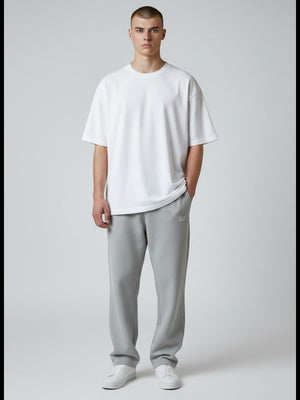 BeachBodyz® light grey oversized fluffy jogging pants with elastic waistband and subtle logo embroidery.