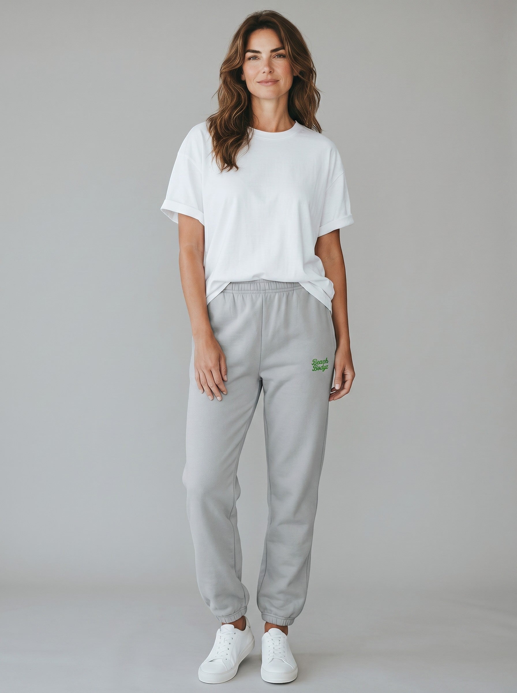 BeachBodyz® light grey oversized fluffy cotton blend jogging pants with green embroidered logo.