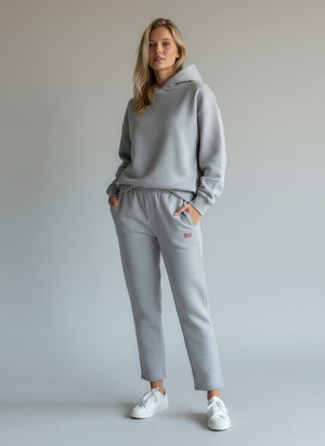 BeachBodyz® light grey cotton-blend jogging pants with embroidered logo, elastic waistband, and side pockets.