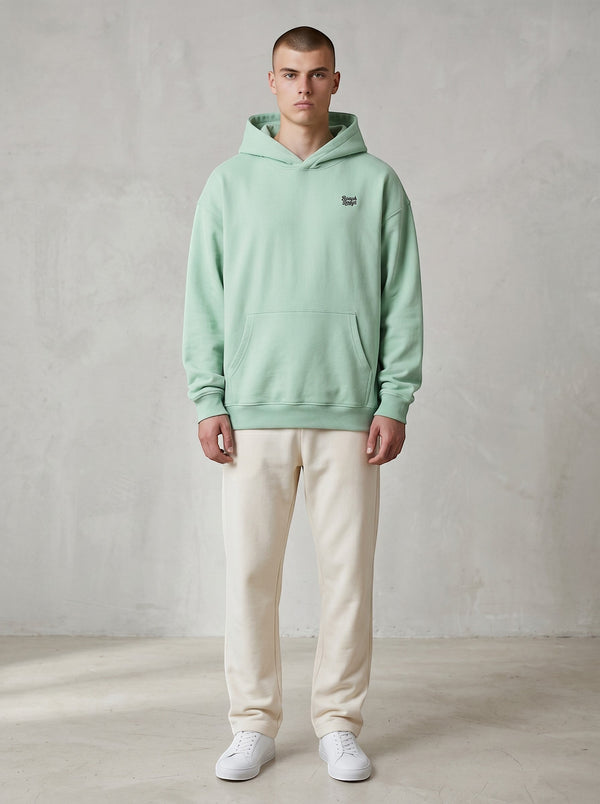 BeachBodyz® light mint green oversized hoodie made from bio-cotton with a small embroidered logo on the chest.