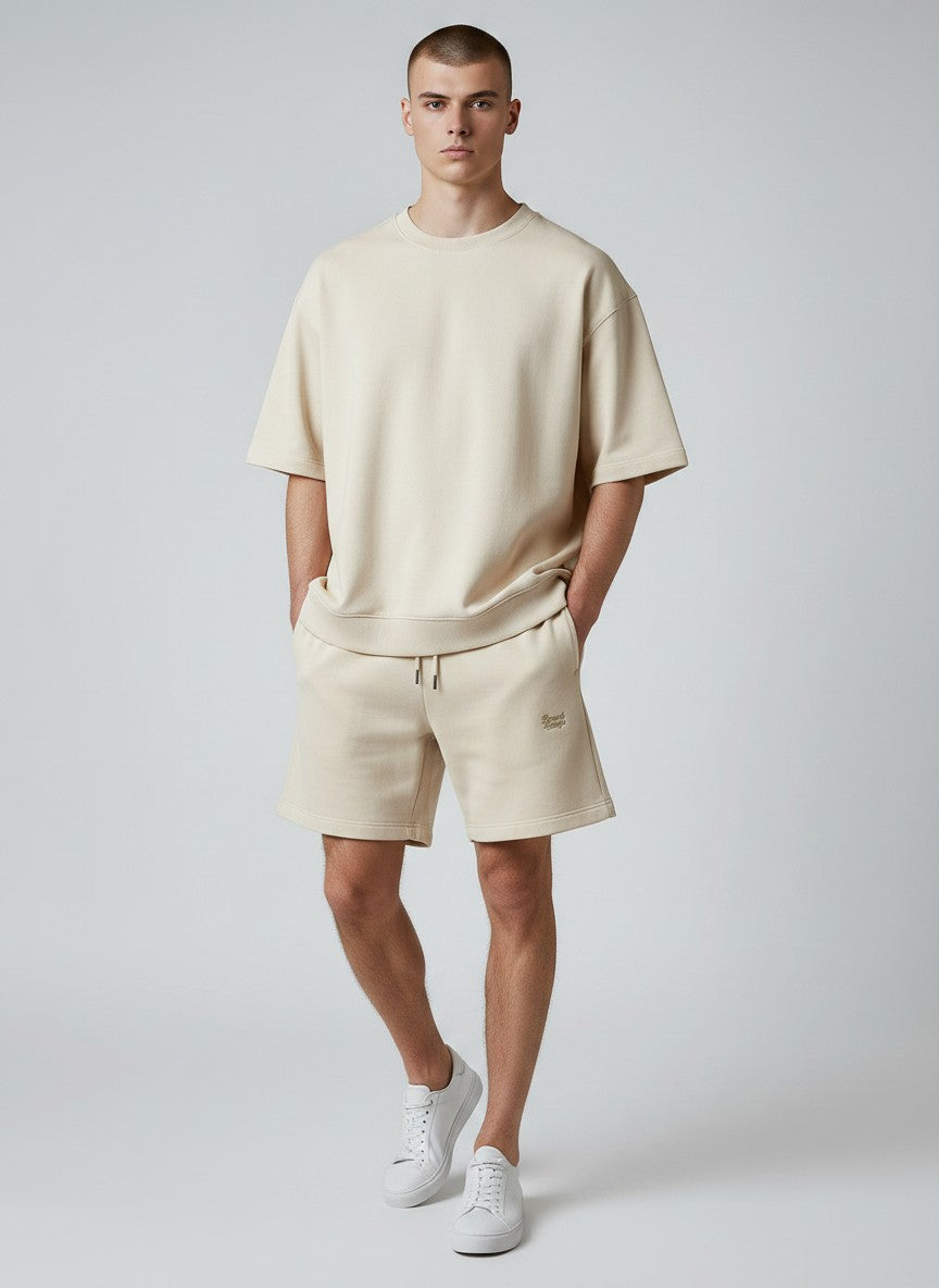 BeachBodyz® natural beige cotton blend jogger shorts with embroidered logo and drawstring waist.