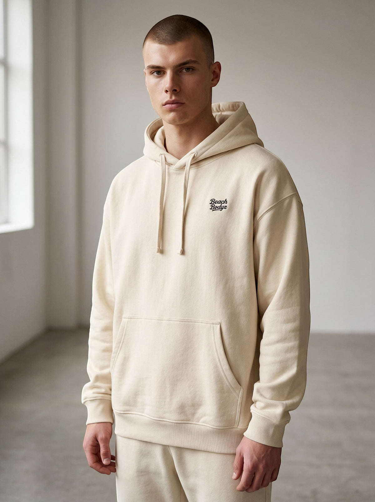 BeachBodyz® Natural Raw oversized hoodie made from 400gsm bio-cotton with embroidered logo and front pocket.