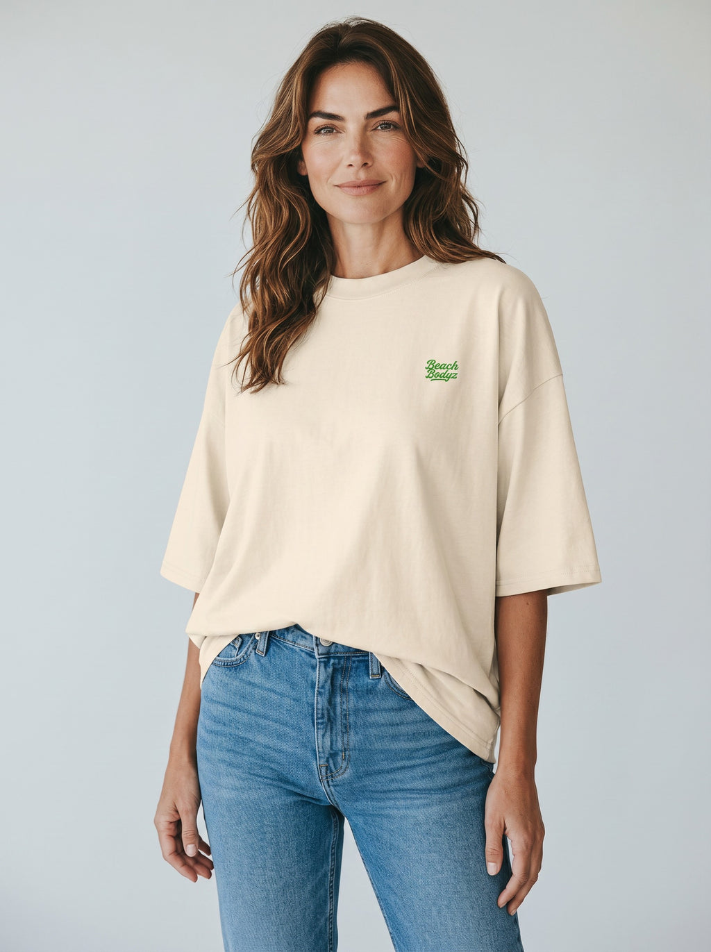 BeachBodyz® natural raw organic cotton oversized t-shirt with green embroidered logo on chest.