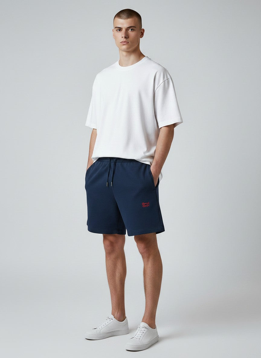 BeachBodyz® navy blue cotton jogger shorts with embroidered logo and drawstring waist. Ideal for streetwear.