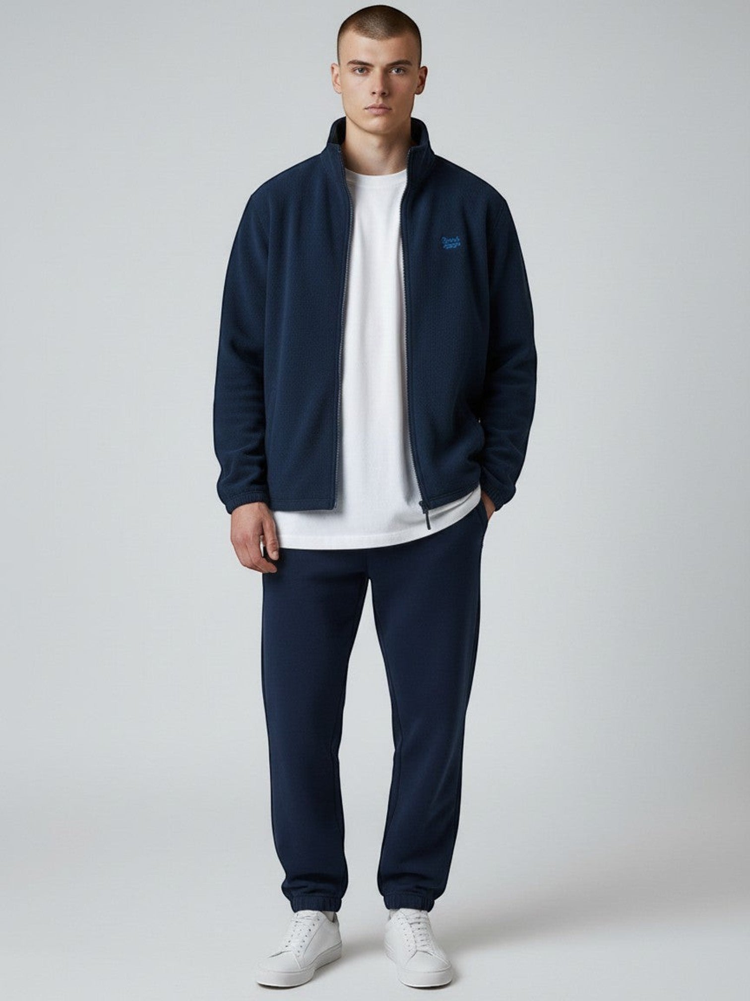 BeachBodyz® navy blue fleece jacket with embroidered logo on chest, full zip, and side pockets. Streetwear style.