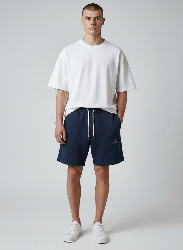 BeachBodyz® navy blue organic cotton jogger shorts with embroidered logo and drawstring waist.