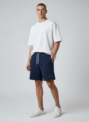 BeachBodyz® navy blue organic cotton jogger shorts with embroidered logo and drawstring waist.