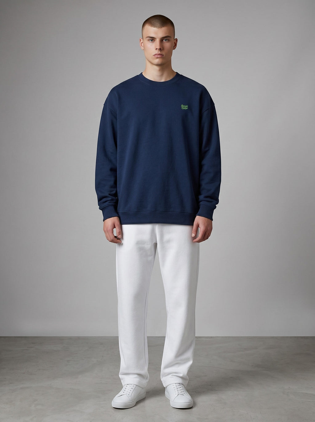 BeachBodyz® navy blue oversized sweatshirt made from organic cotton with a small embroidered logo on the chest.