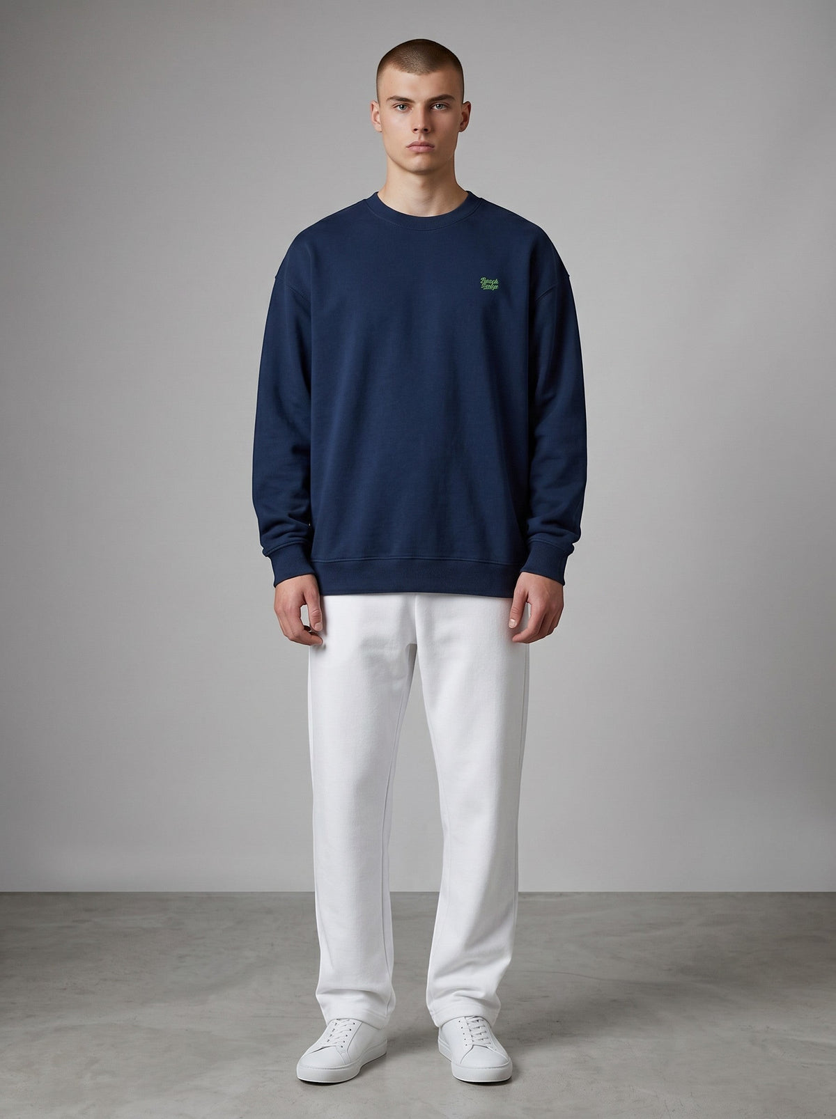 BeachBodyz® navy blue oversized sweatshirt made from organic cotton with a small embroidered logo on the chest.