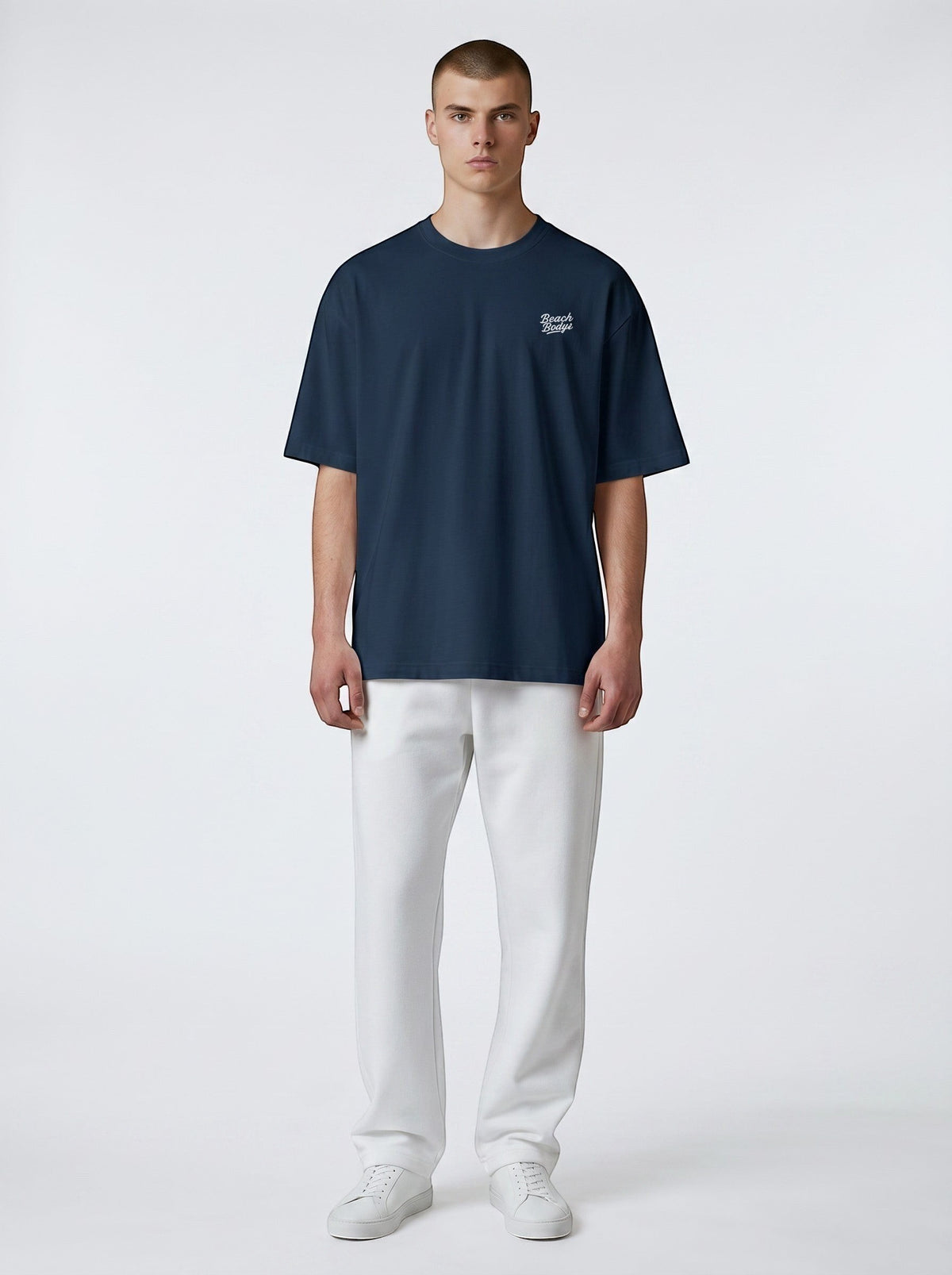 BeachBodyz® navy blue oversized organic cotton t-shirt with subtle chest embroidery and crew neck.