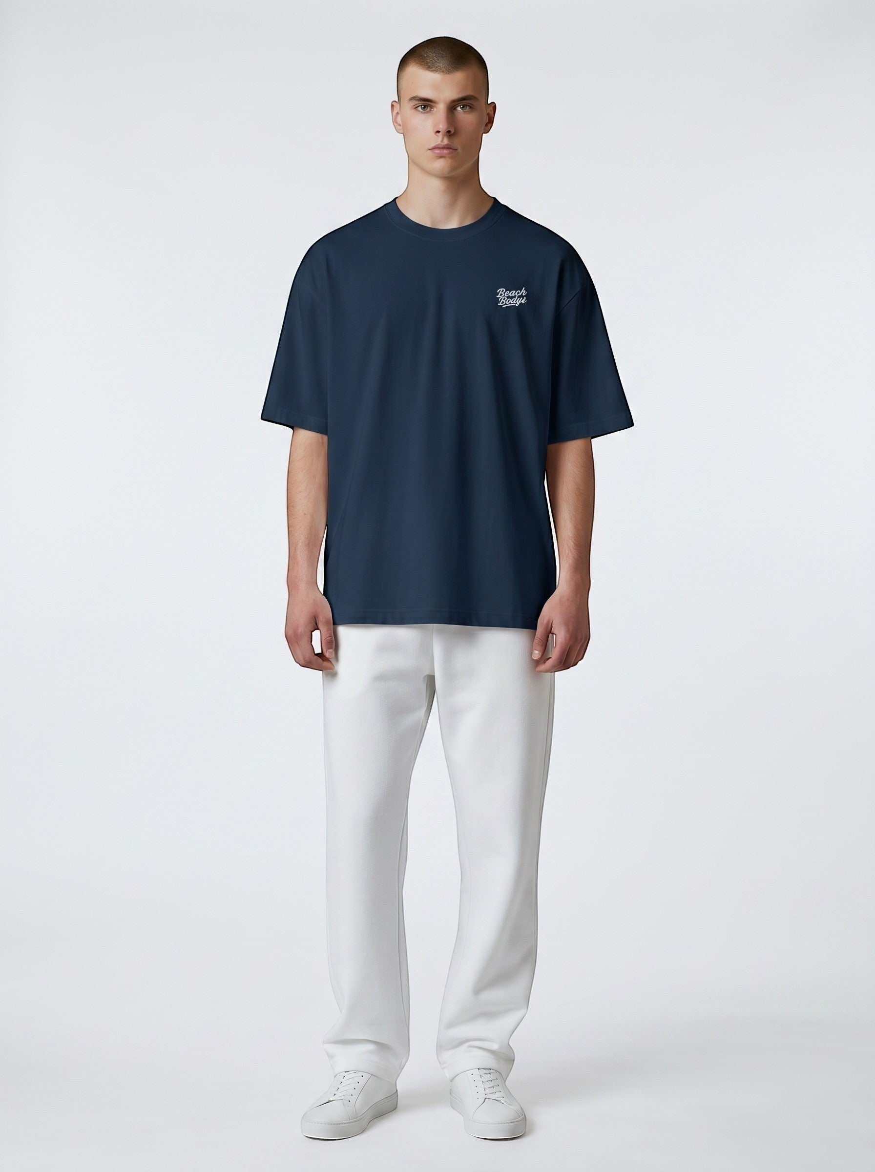 BeachBodyz® navy blue oversized organic cotton t-shirt with subtle chest embroidery and crew neck.
