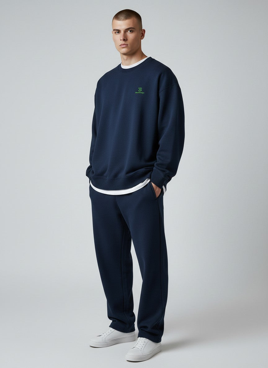 BeachBodyz® navy blue oversized sweatshirt made from organic cotton with a green embroidered logo on the chest.