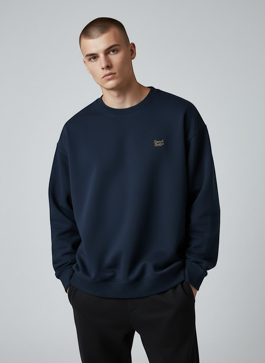 BeachBodyz® navy blue oversized sweatshirt made from organic cotton with a small embroidered logo on the chest.