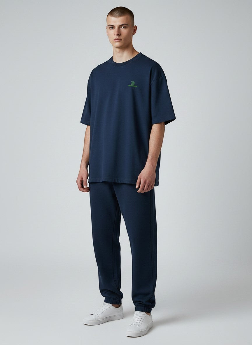 BeachBodyz® navy blue oversized t-shirt made from organic cotton with a small green embroidered logo on the chest.