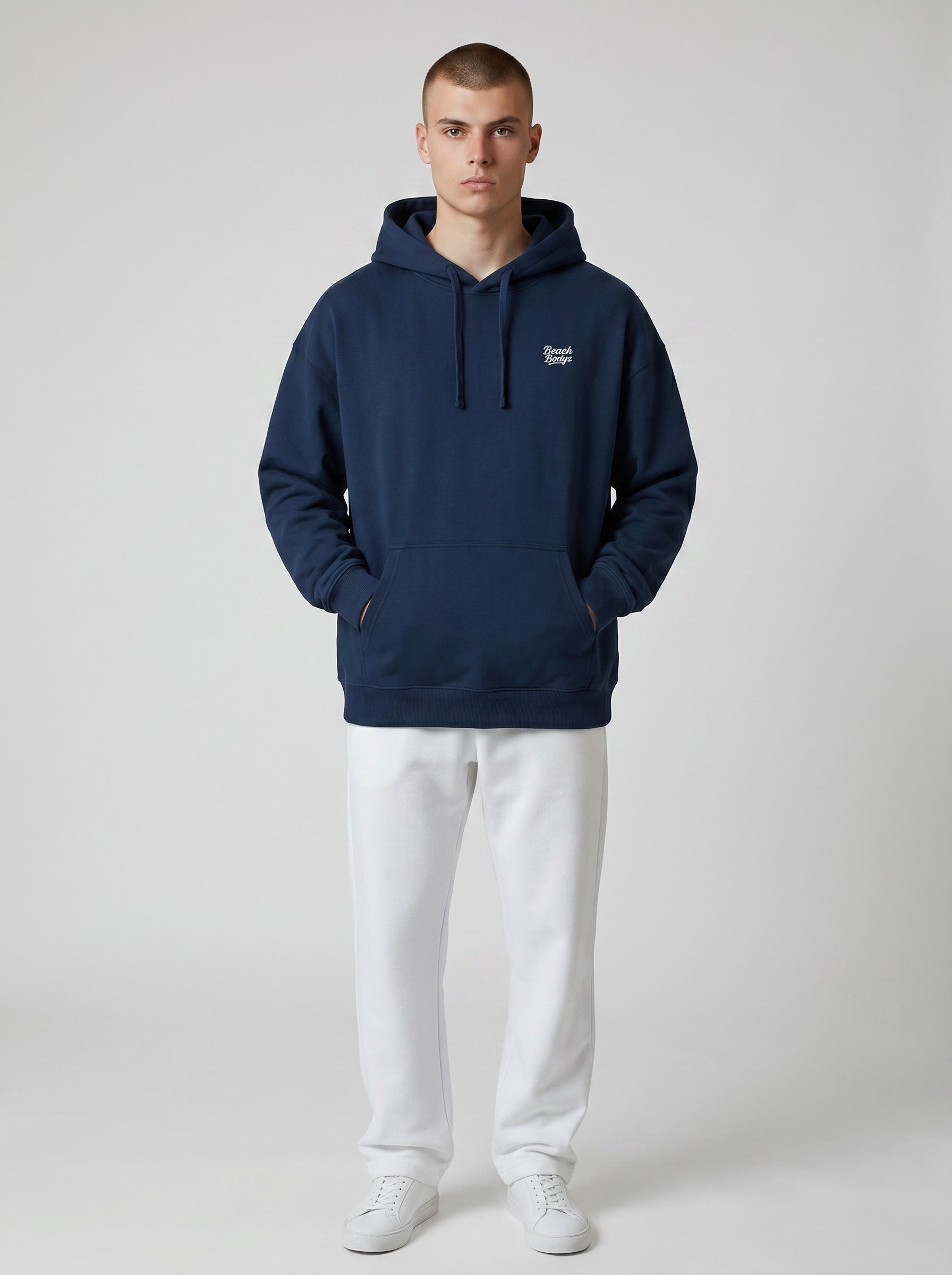 BeachBodyz® navy blue oversized hoodie with white embroidered logo on chest, made from soft organic cotton.