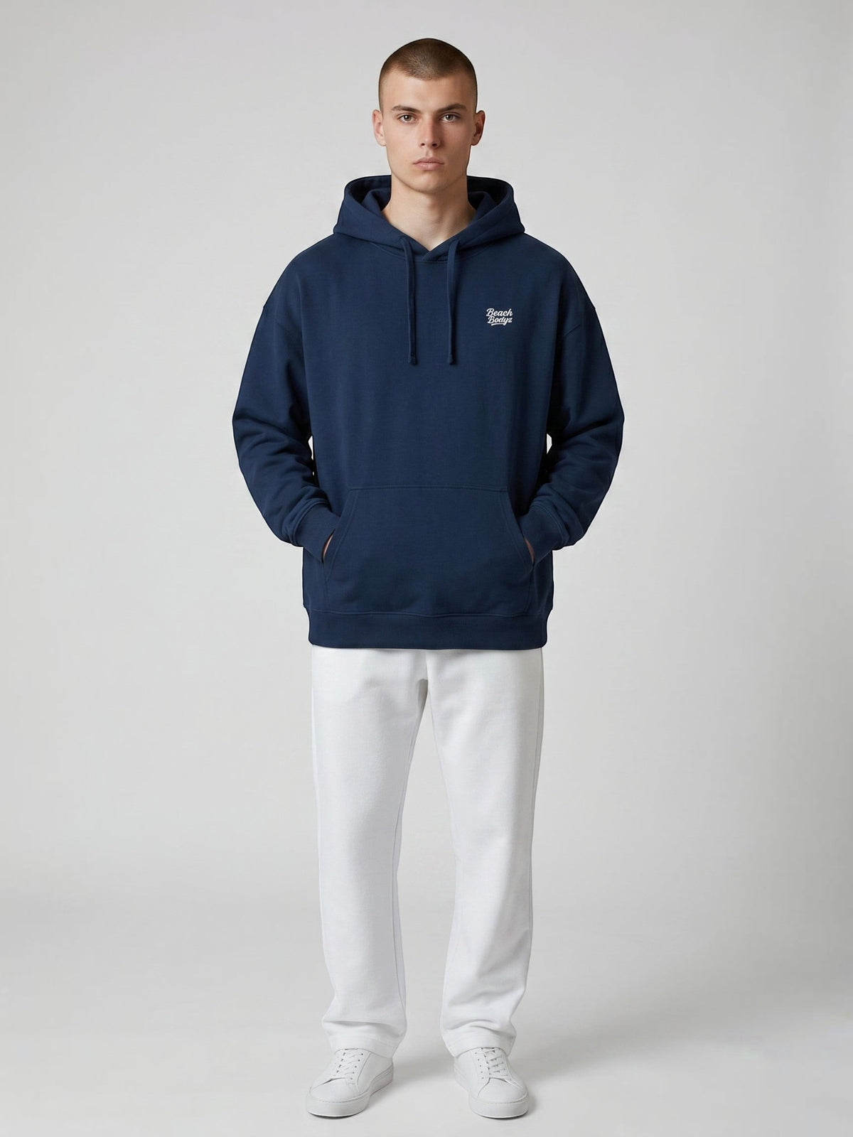 BeachBodyz® navy blue oversized hoodie with white embroidered logo on chest, made from soft organic cotton.