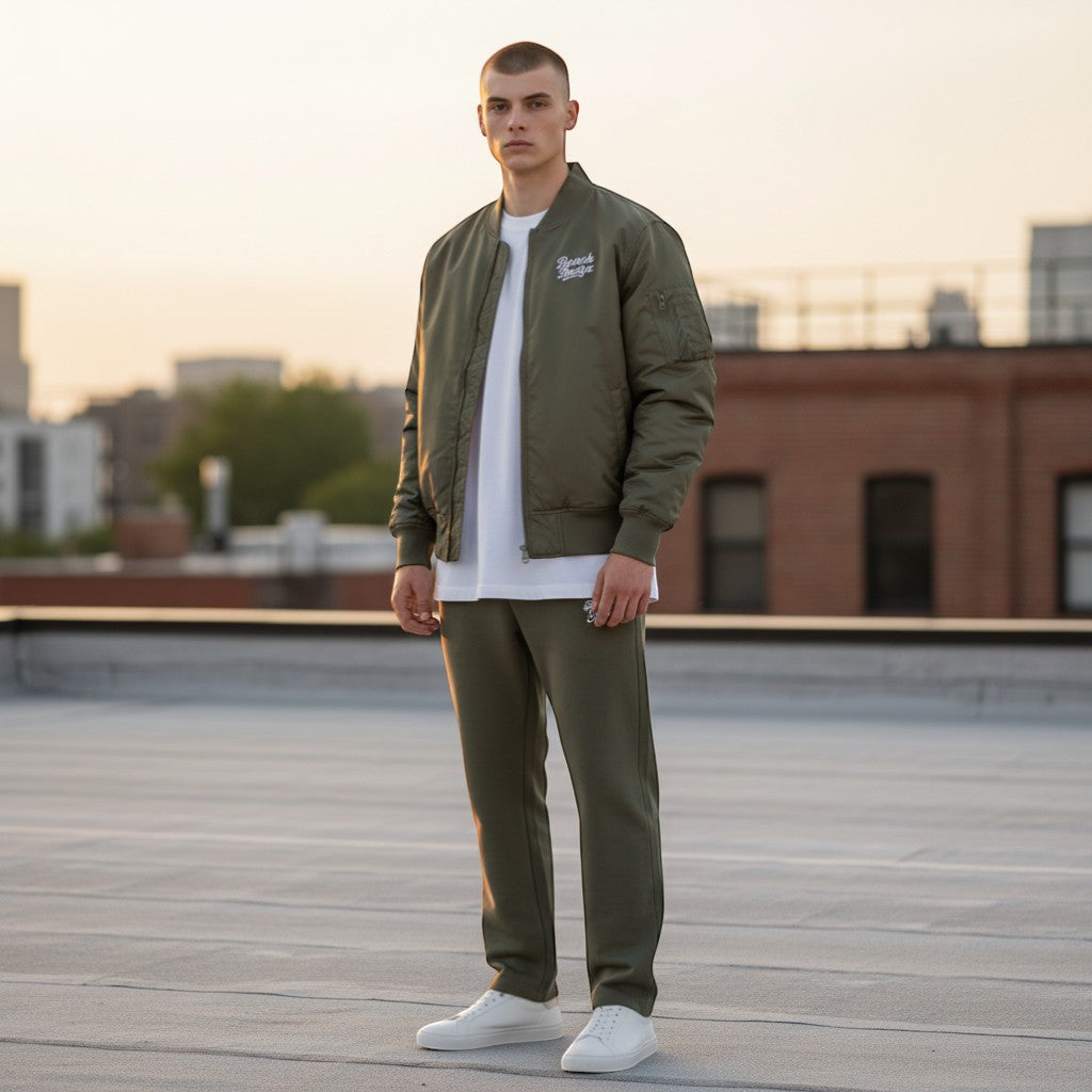 BeachBodyz® olive green bomber jacket with white embroidered logo on chest and orange lining.
