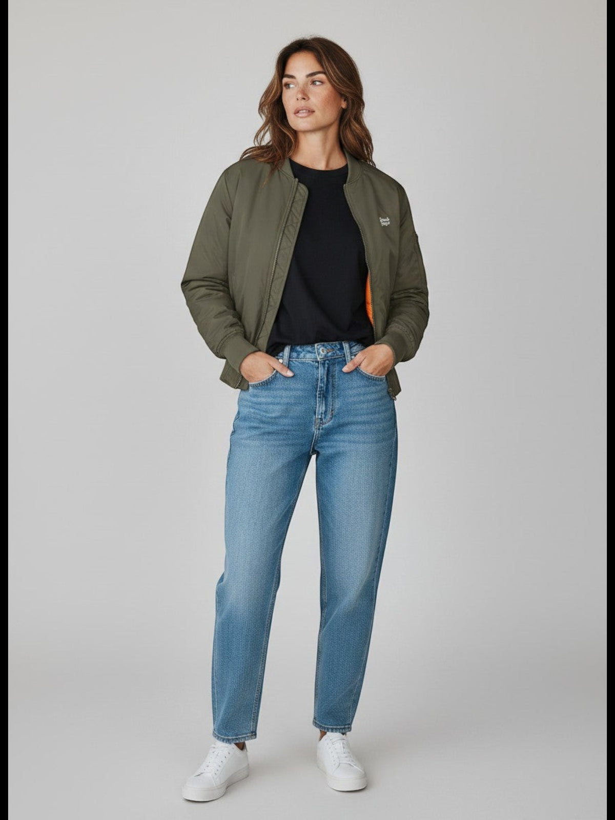 BeachBodyz® olive green bomber jacket with orange lining, zip closure, and sleeve pocket. Made from durable synthetic fibers.
