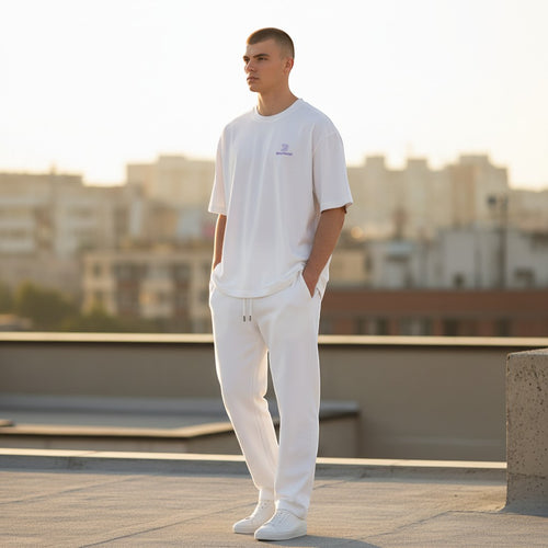 BeachBodyz® light grey oversized cotton t-shirt with purple logo and relaxed fit.